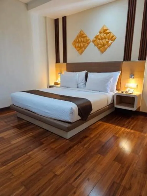 Bed in Sub City Hotel