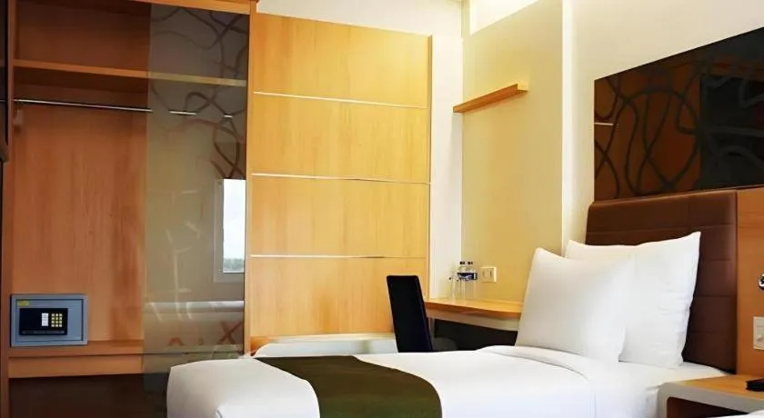 Bed in Sub City Hotel