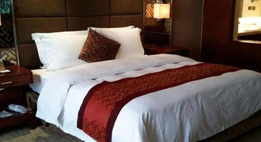 Bed in Blue Horizon International Hotel Gaomi