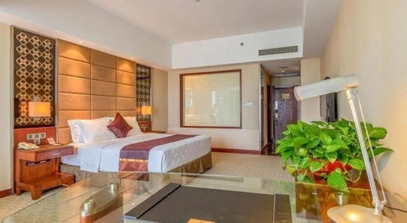 Bed in Blue Horizon International Hotel Gaomi