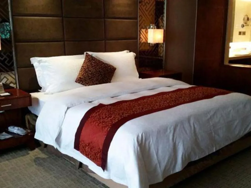 Bed in Blue Horizon International Hotel Gaomi