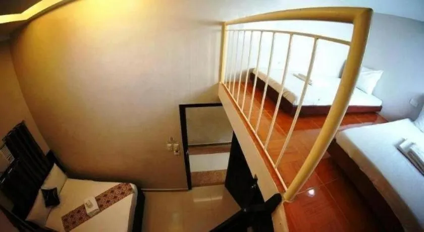 Bed in Rovic's Tourist Hotel