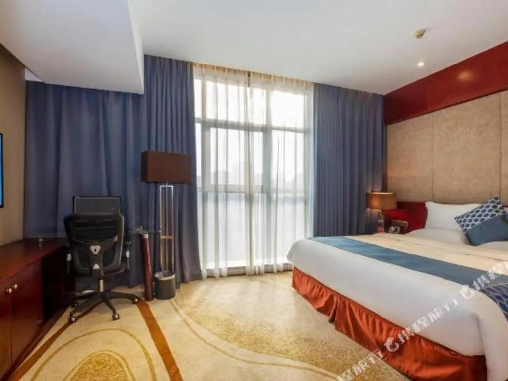 Bed in Quanzhou Jinjiang Hollyston Hotel