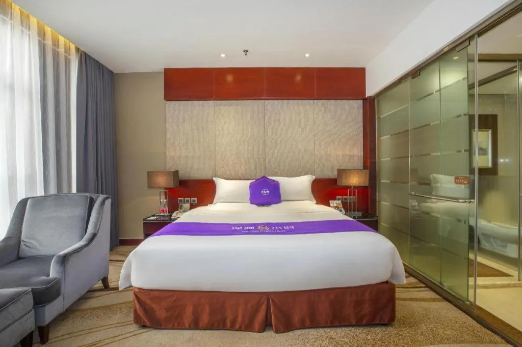 Bed in Quanzhou Jinjiang Hollyston Hotel