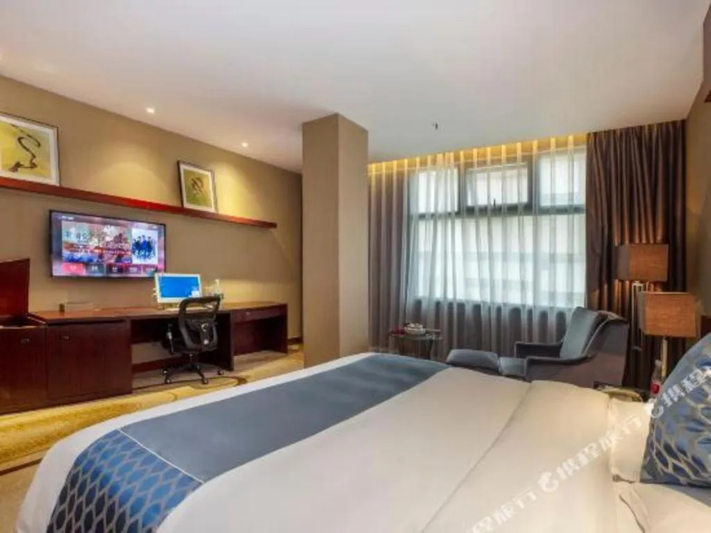 Bed in Quanzhou Jinjiang Hollyston Hotel