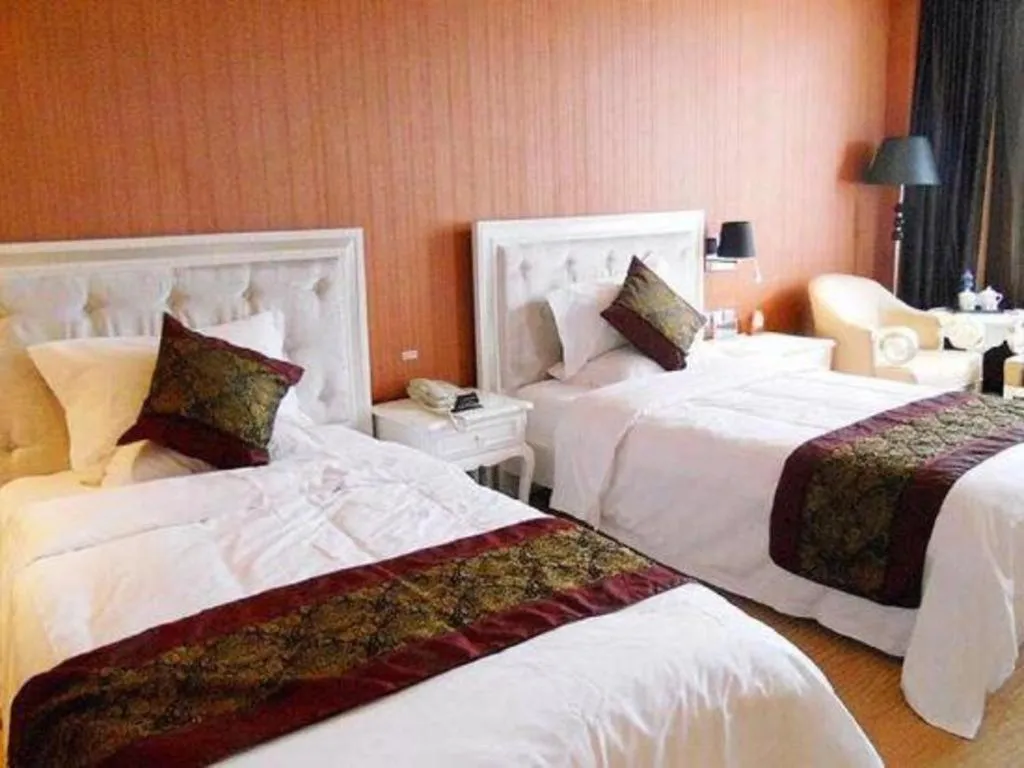 Bed in Metropark Hotel