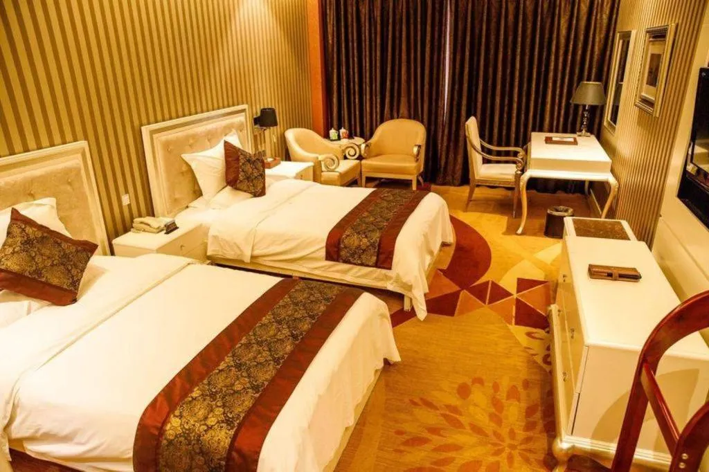 Bed in Metropark Hotel