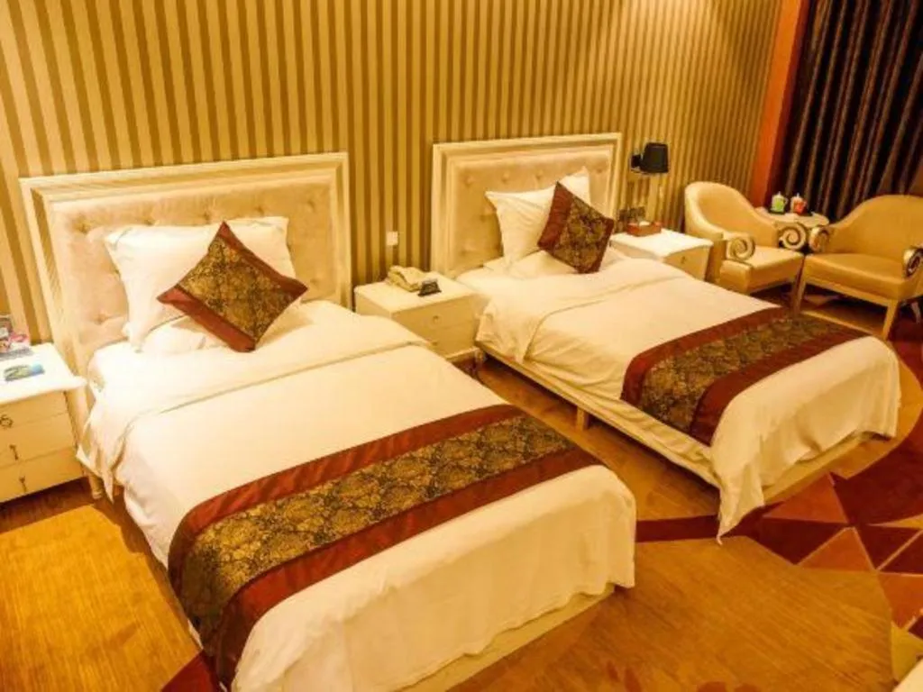 Bed in Metropark Hotel