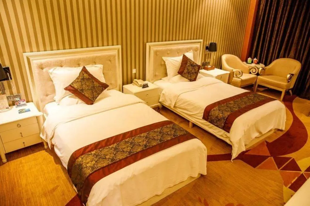 Bed in Metropark Hotel