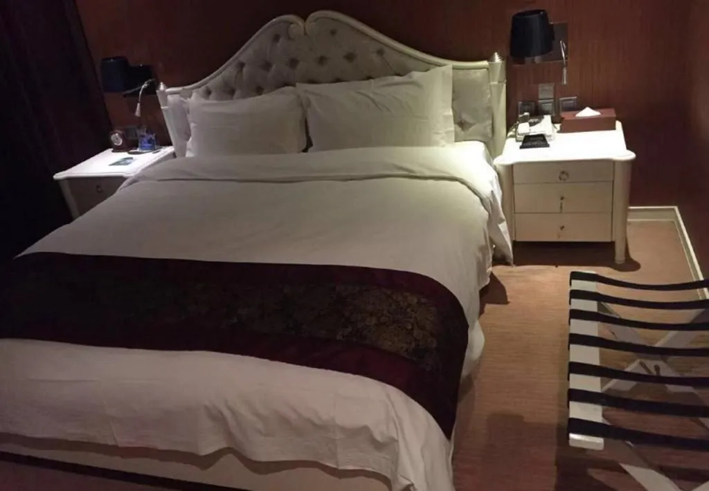 Bed in Metropark Hotel