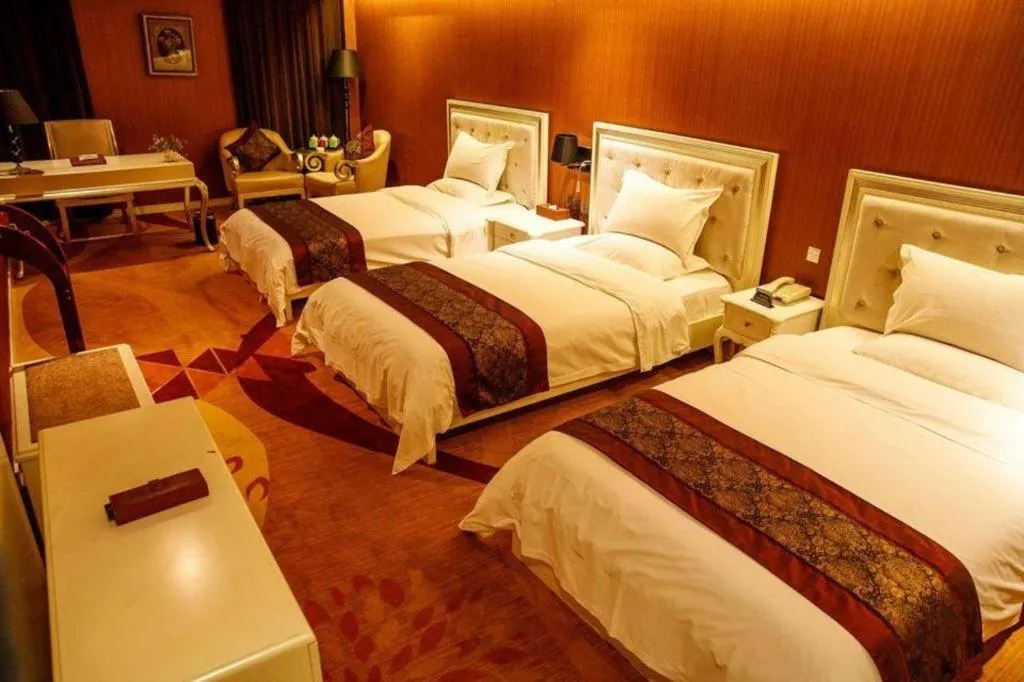 Bed in Metropark Hotel