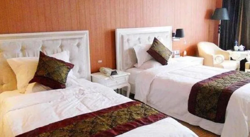 Bed in Metropark Hotel