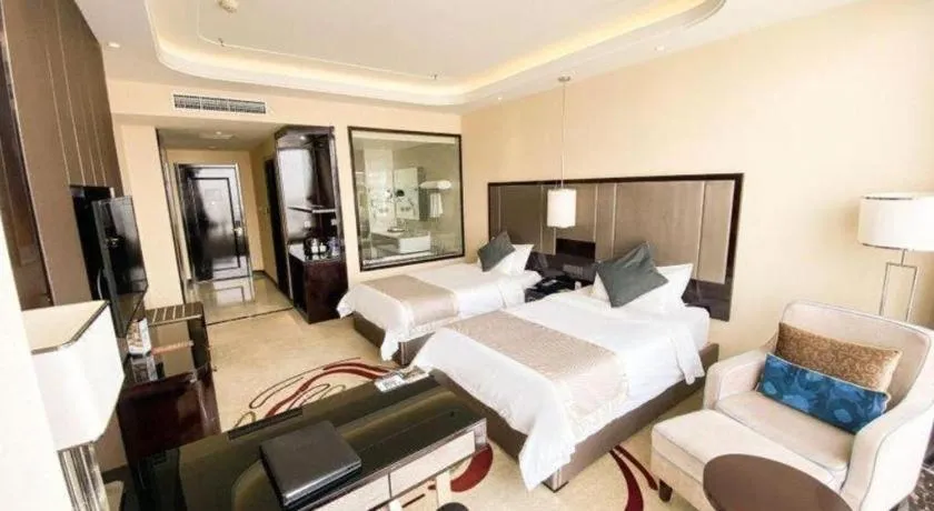 Bed in Pacific Regency Hotel Shenyang