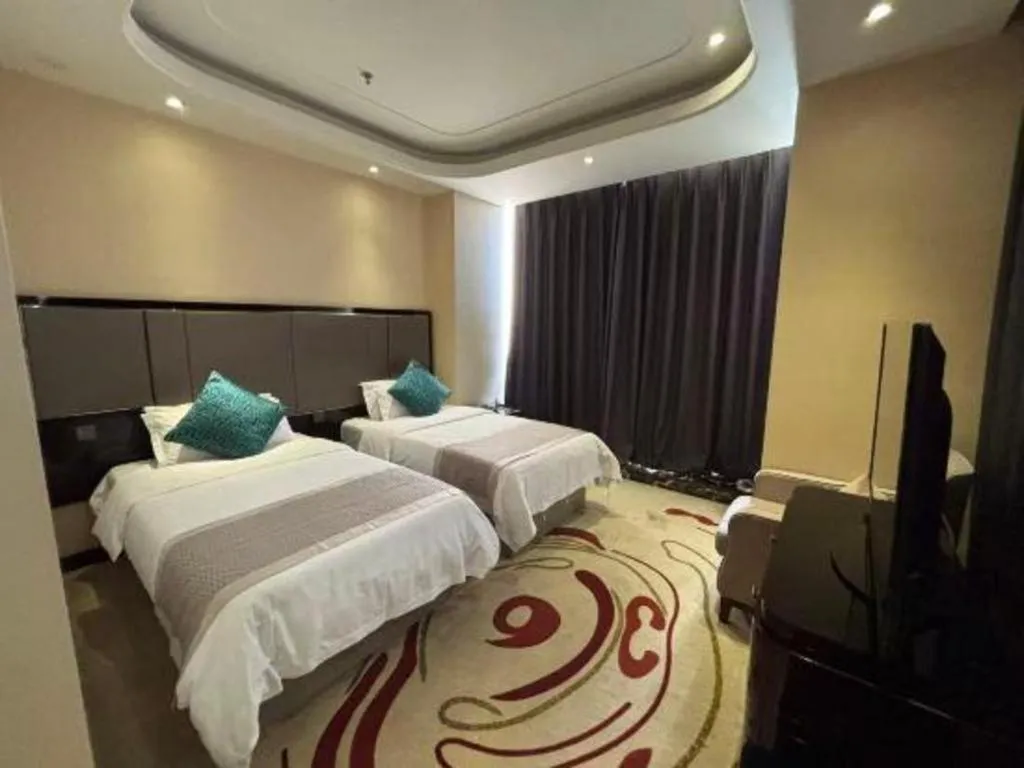 Bed in Pacific Regency Hotel Shenyang