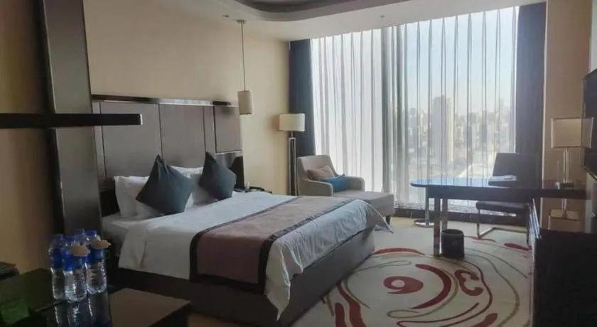 Bed in Pacific Regency Hotel Shenyang