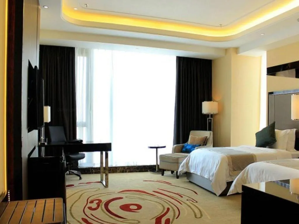 Bed in Pacific Regency Hotel Shenyang