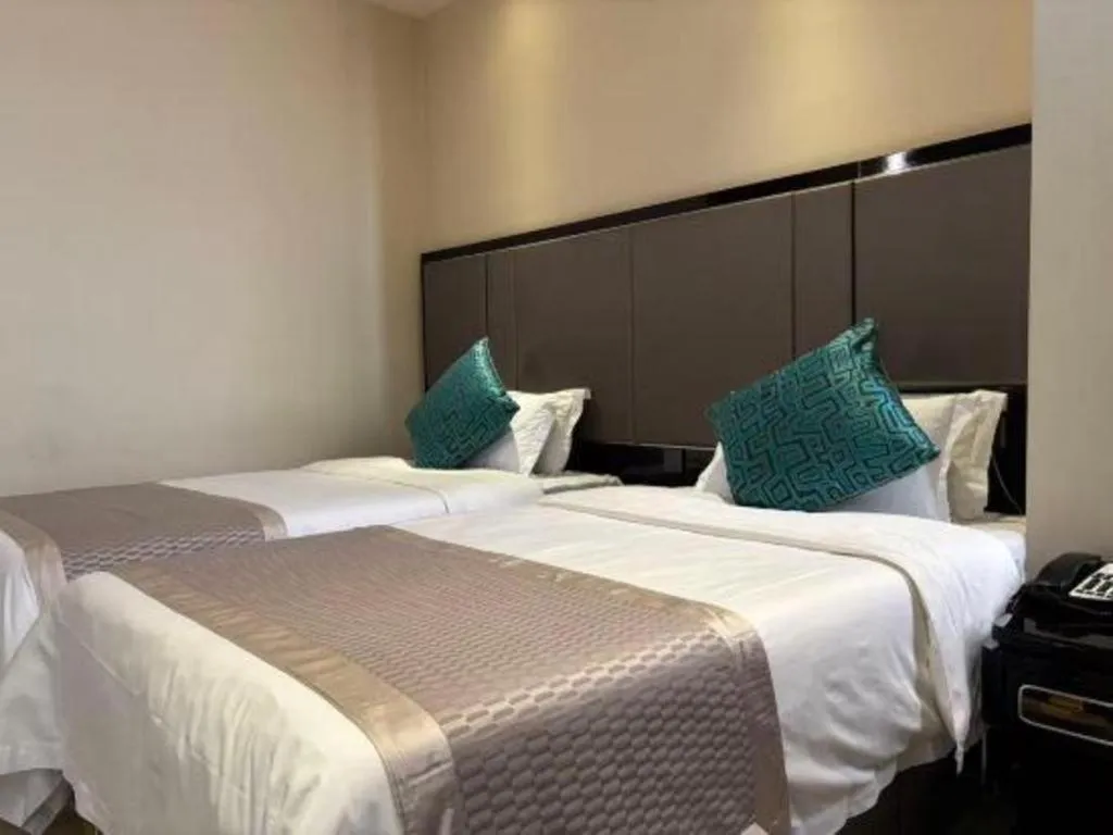 Bed in Pacific Regency Hotel Shenyang