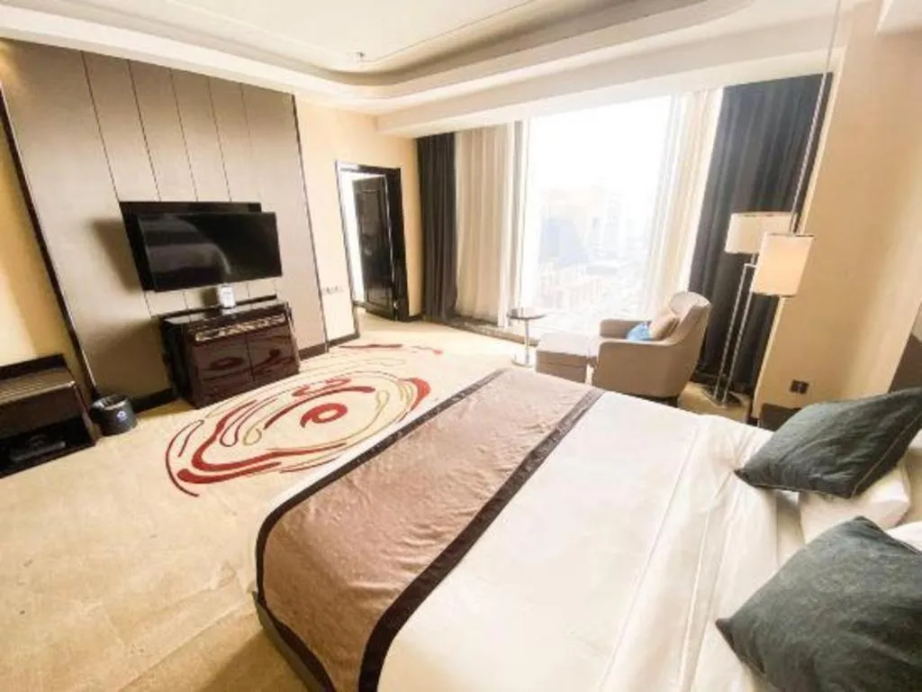 Bed in Pacific Regency Hotel Shenyang