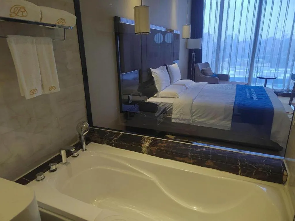 Bed in Pacific Regency Hotel Shenyang