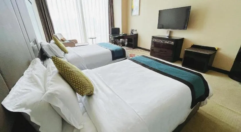 Bed in Pacific Regency Hotel Shenyang