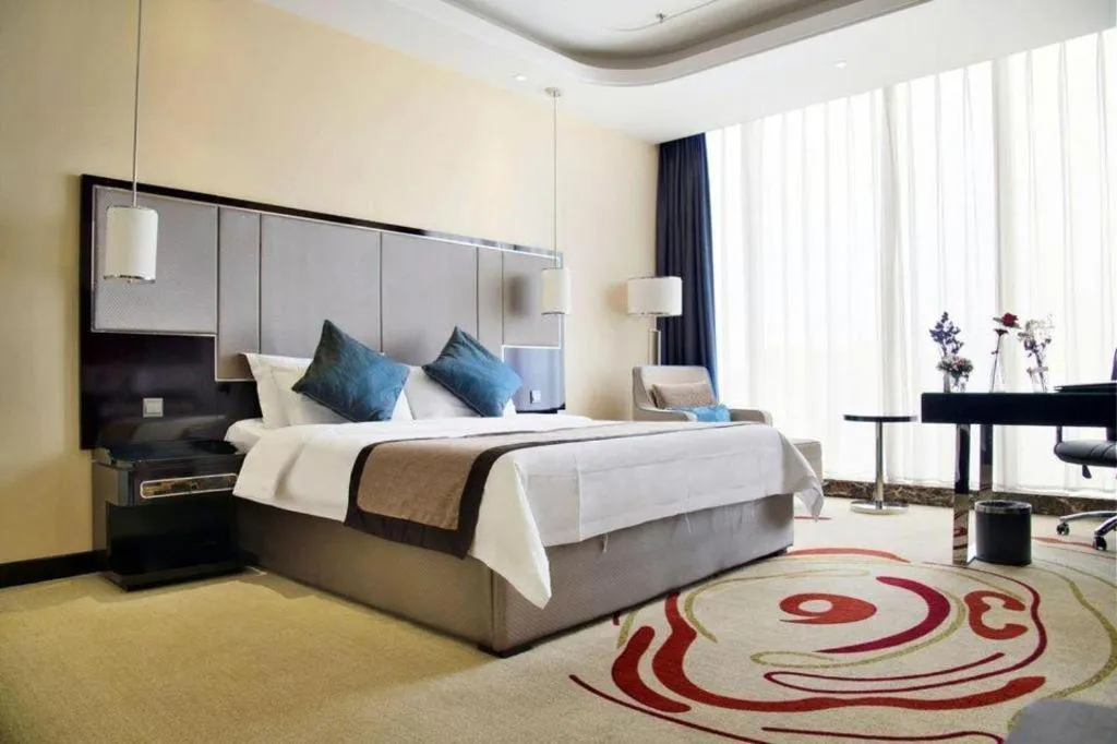 Bed in Pacific Regency Hotel Shenyang