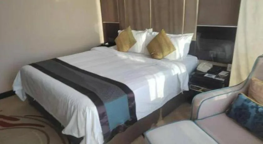 Bed in Pacific Regency Hotel Shenyang