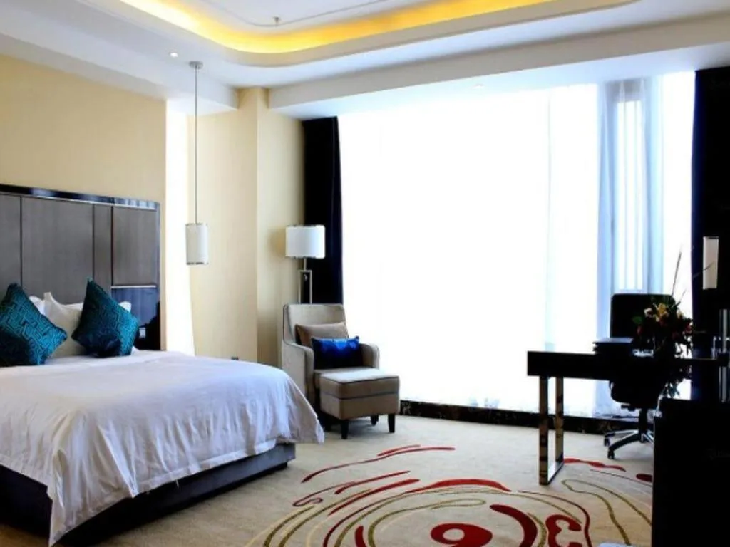Bed in Pacific Regency Hotel Shenyang