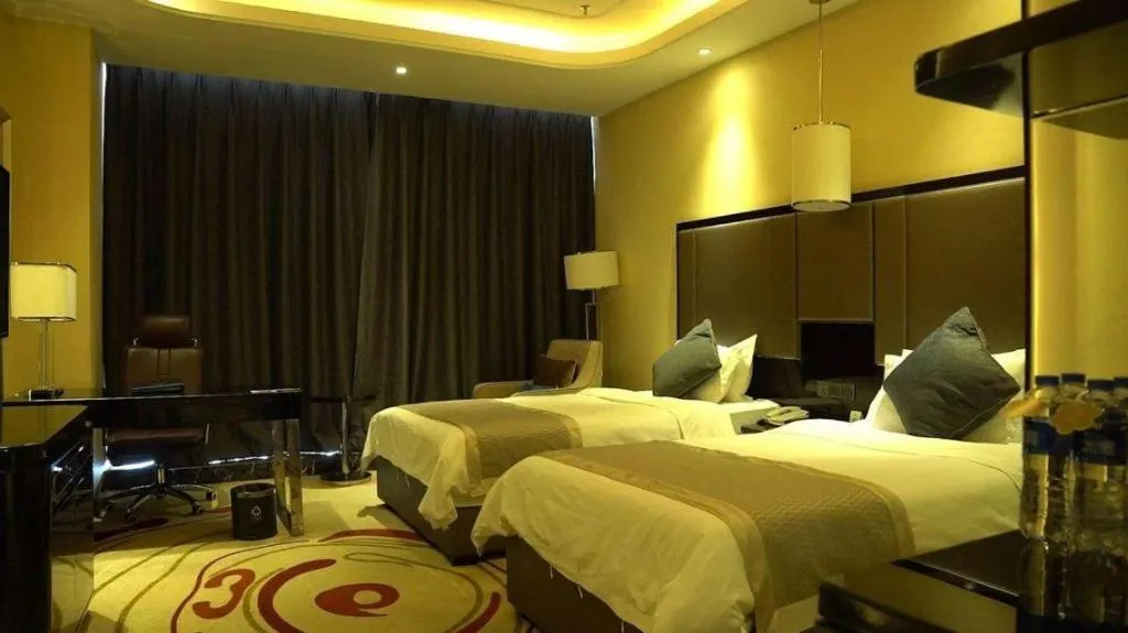 Bed in Pacific Regency Hotel Shenyang