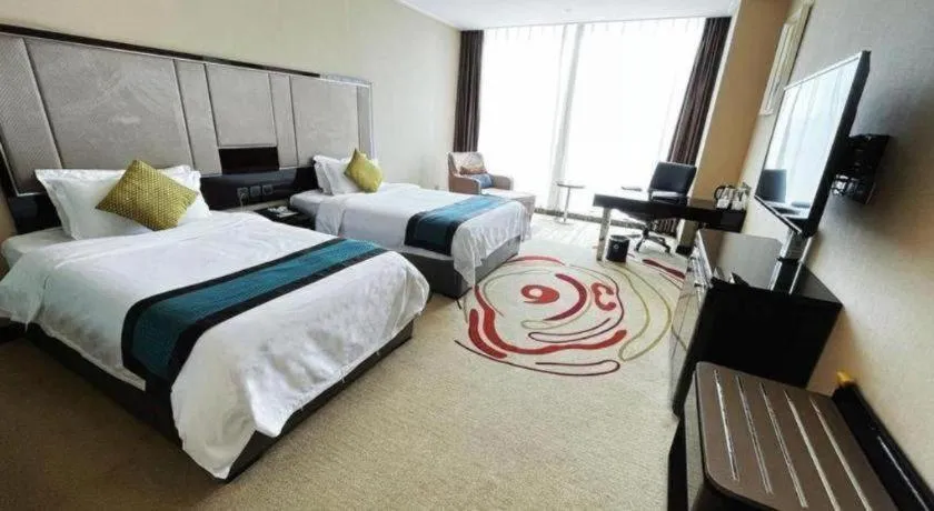 Bed in Pacific Regency Hotel Shenyang