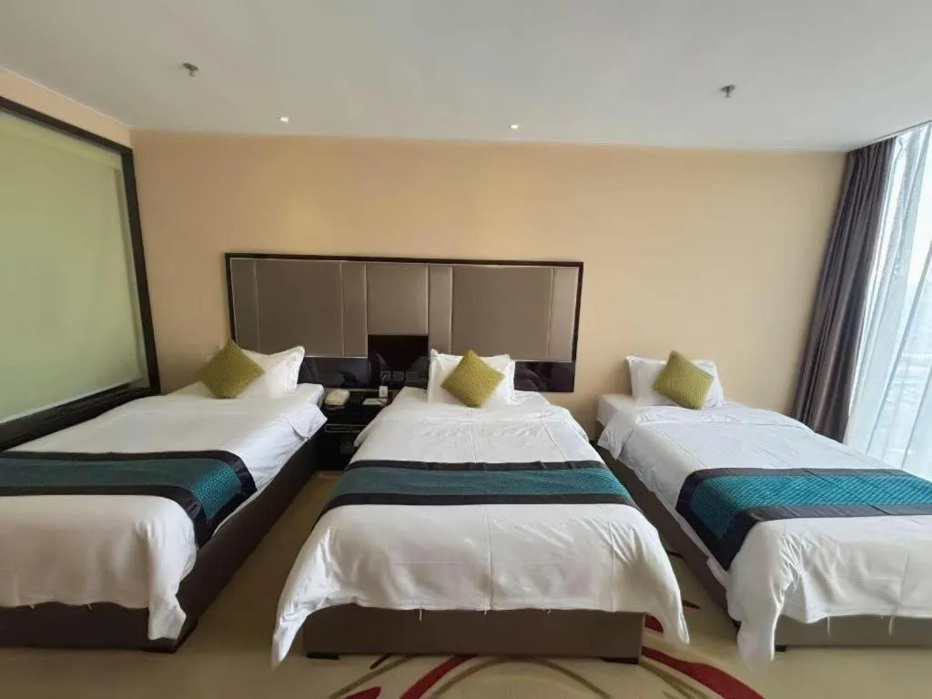 Bed in Pacific Regency Hotel Shenyang