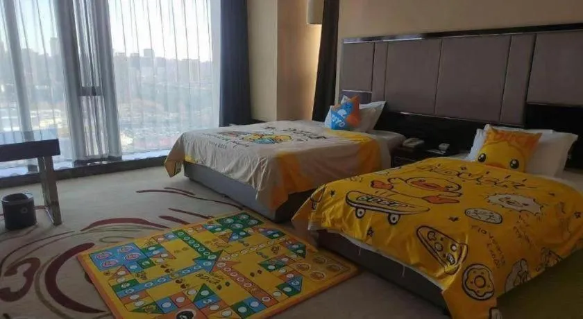 Bed in Pacific Regency Hotel Shenyang