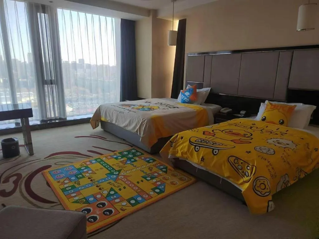 Bed in Pacific Regency Hotel Shenyang