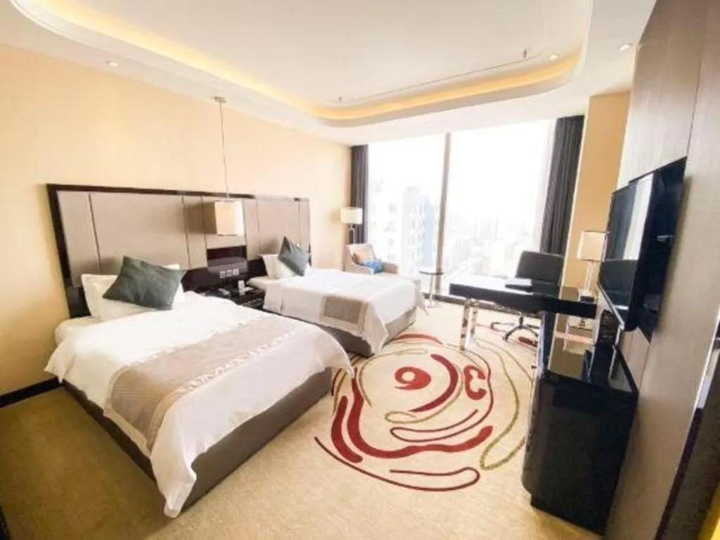 Bed in Pacific Regency Hotel Shenyang
