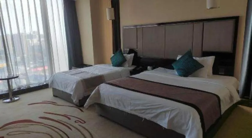 Bed in Pacific Regency Hotel Shenyang