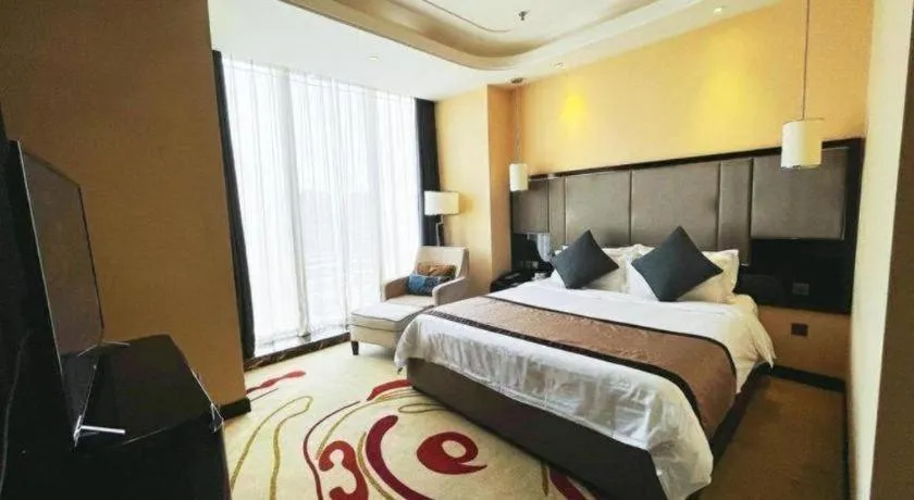 Bed in Pacific Regency Hotel Shenyang