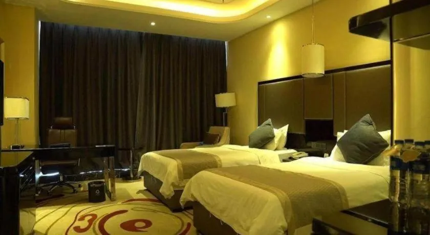 Bed in Pacific Regency Hotel Shenyang