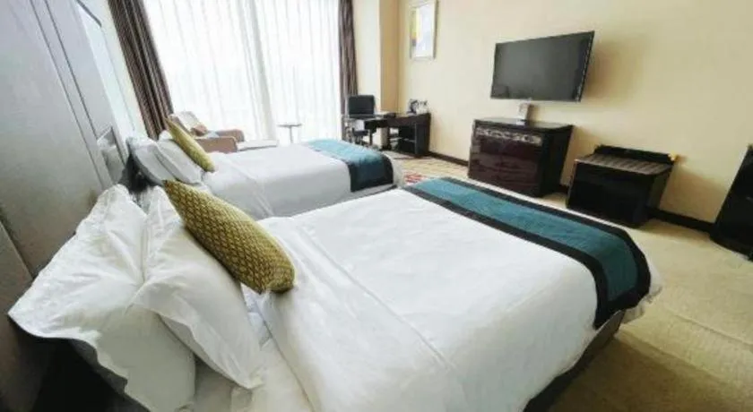 Bed in Pacific Regency Hotel Shenyang