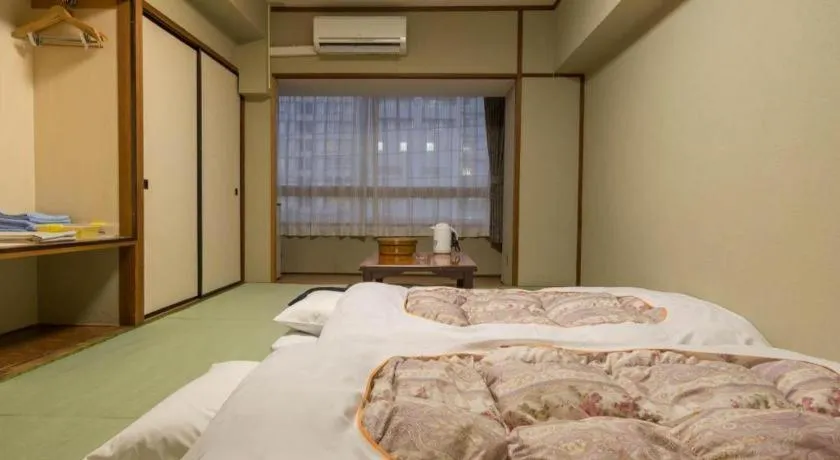 Bed in Hotel Town Center