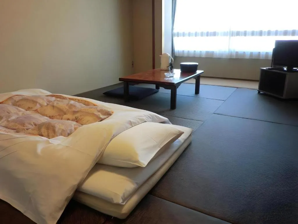 Bed in Hotel Town Center