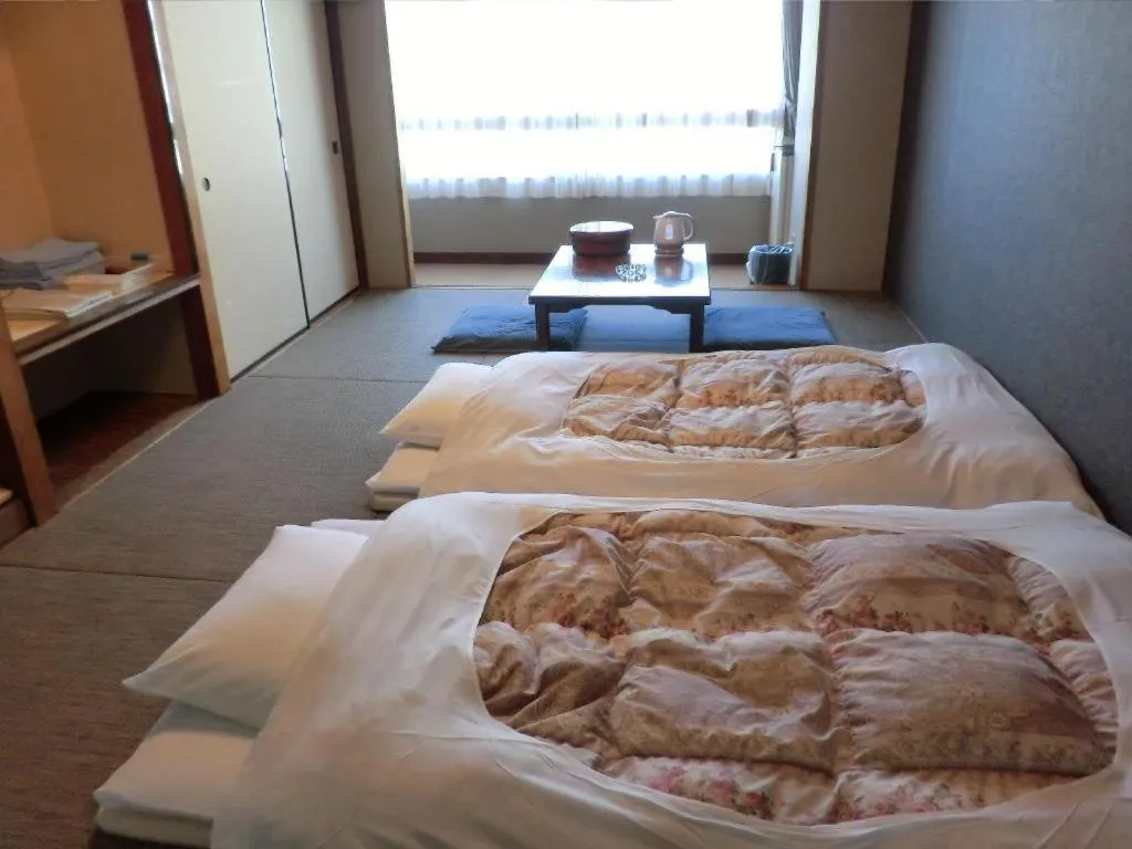 Bed in Hotel Town Center