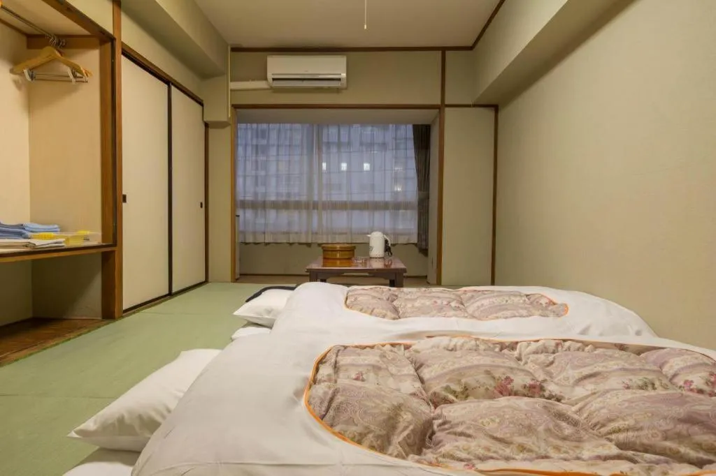 Bed in Hotel Town Center