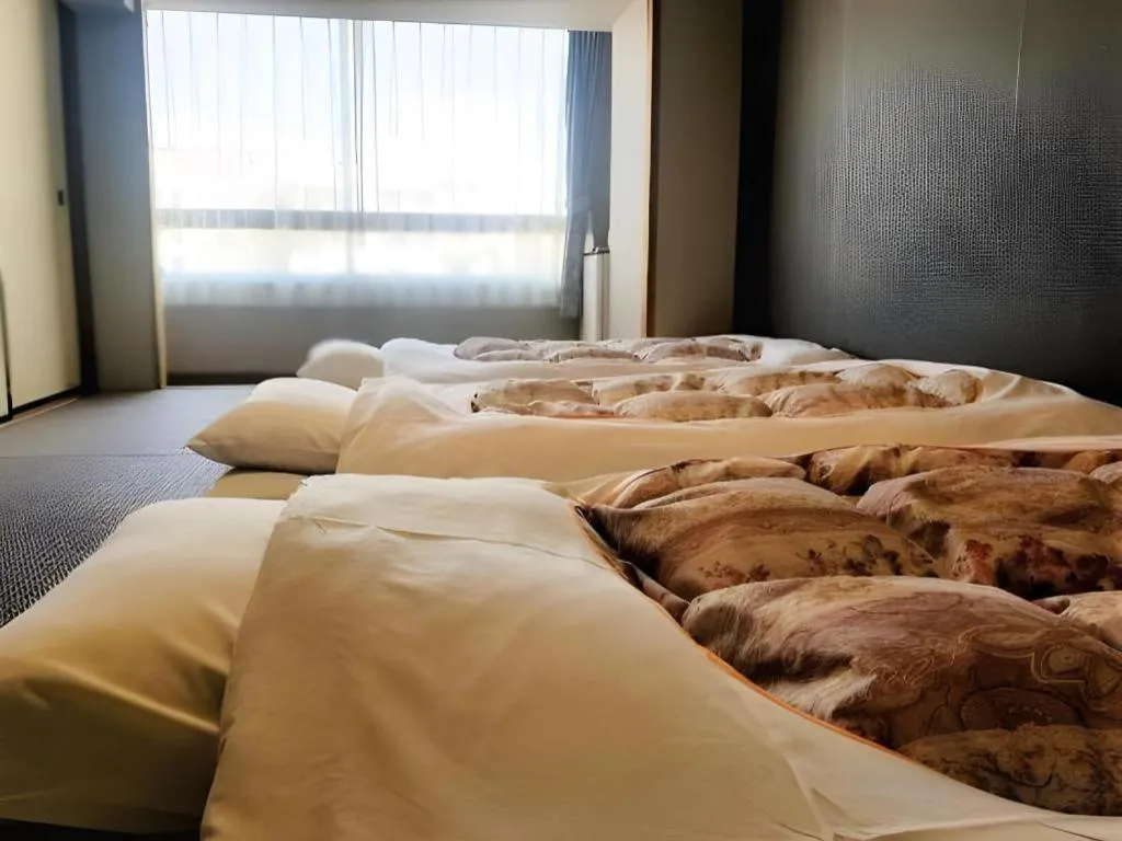 Bed in Hotel Town Center