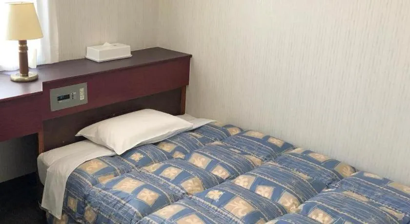 Bed in Hotel Town Nishikigawa