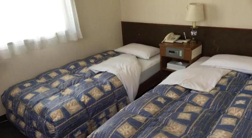 Bed in Hotel Town Nishikigawa