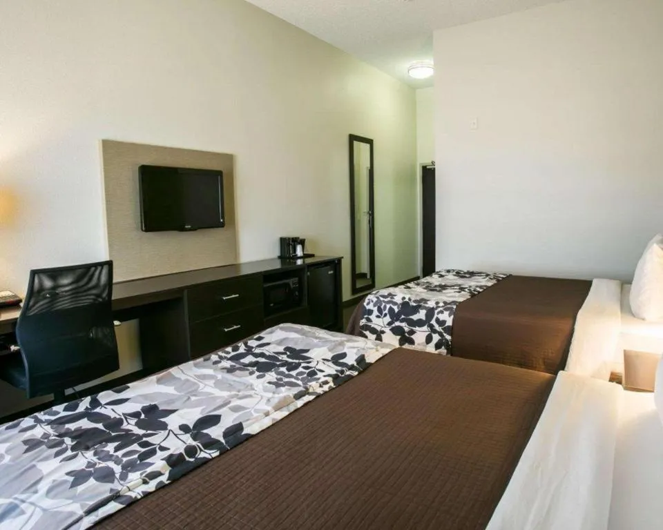 Bed in Sleep Inn & Suites Dripping Springs - Austin Area