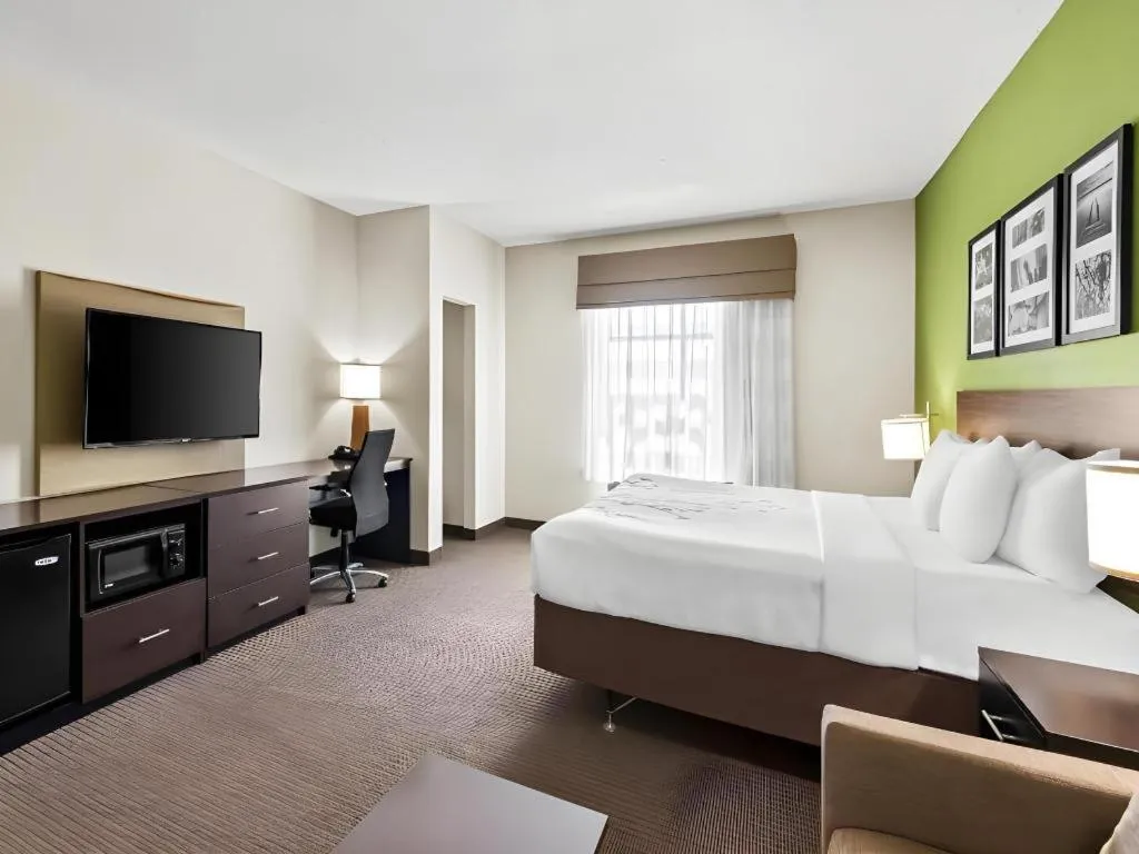 Bed in Sleep Inn & Suites Dripping Springs - Austin Area