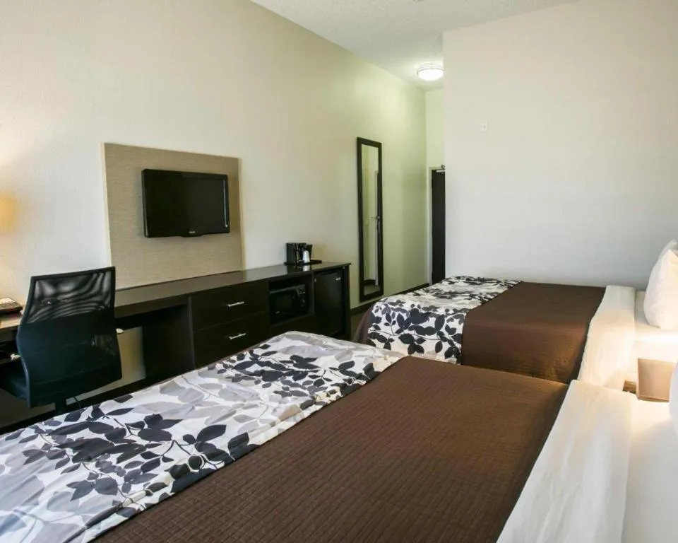 Bed in Sleep Inn & Suites Dripping Springs - Austin Area