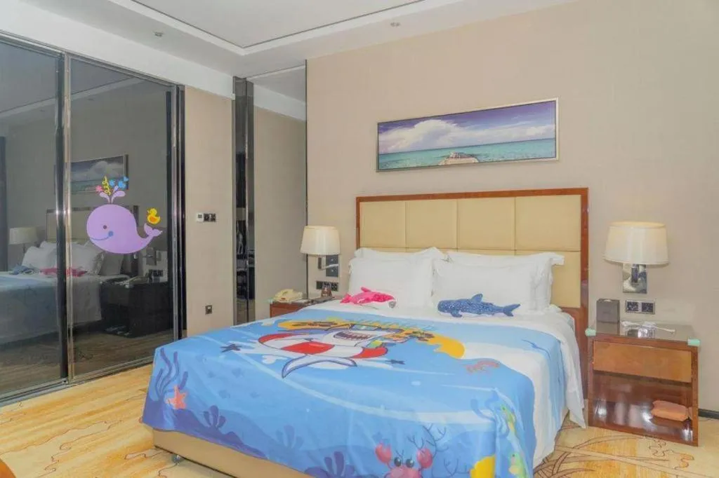 Bed in Golden Phoenix International Hotel