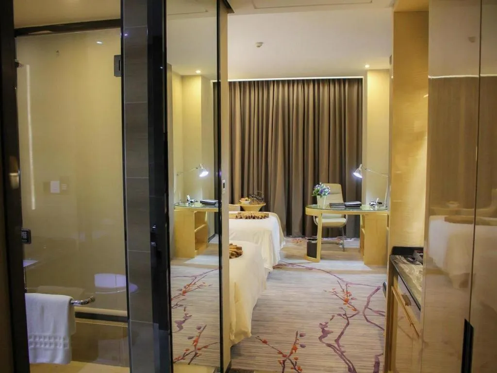 Bed in Golden Phoenix International Hotel