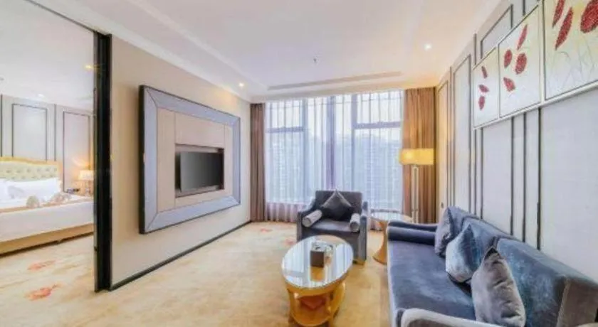 Bed in Golden Phoenix International Hotel